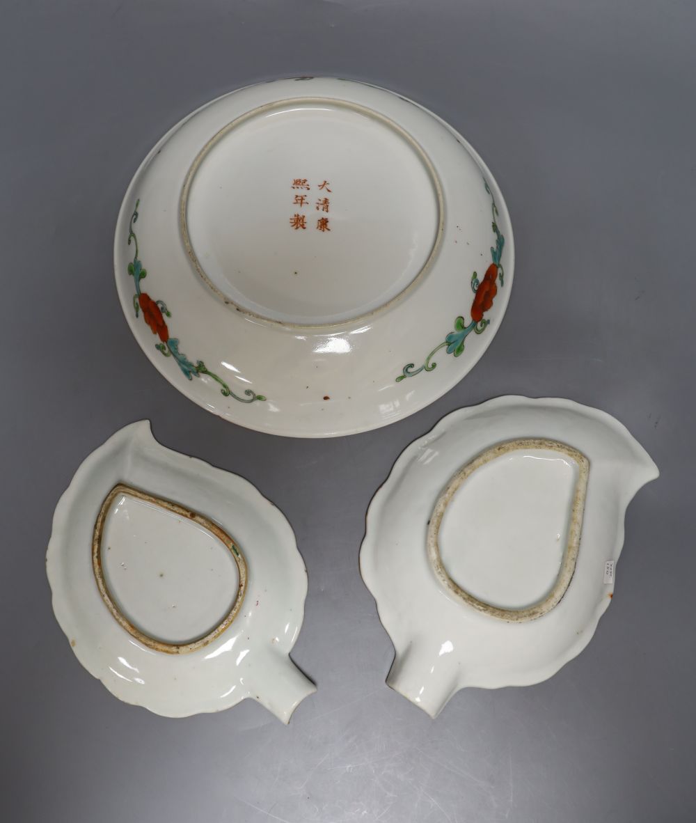 A Chinese enamelled porcelain saucer dish, 25cm, and two Canton leaf dishes, 19cm and 18cm